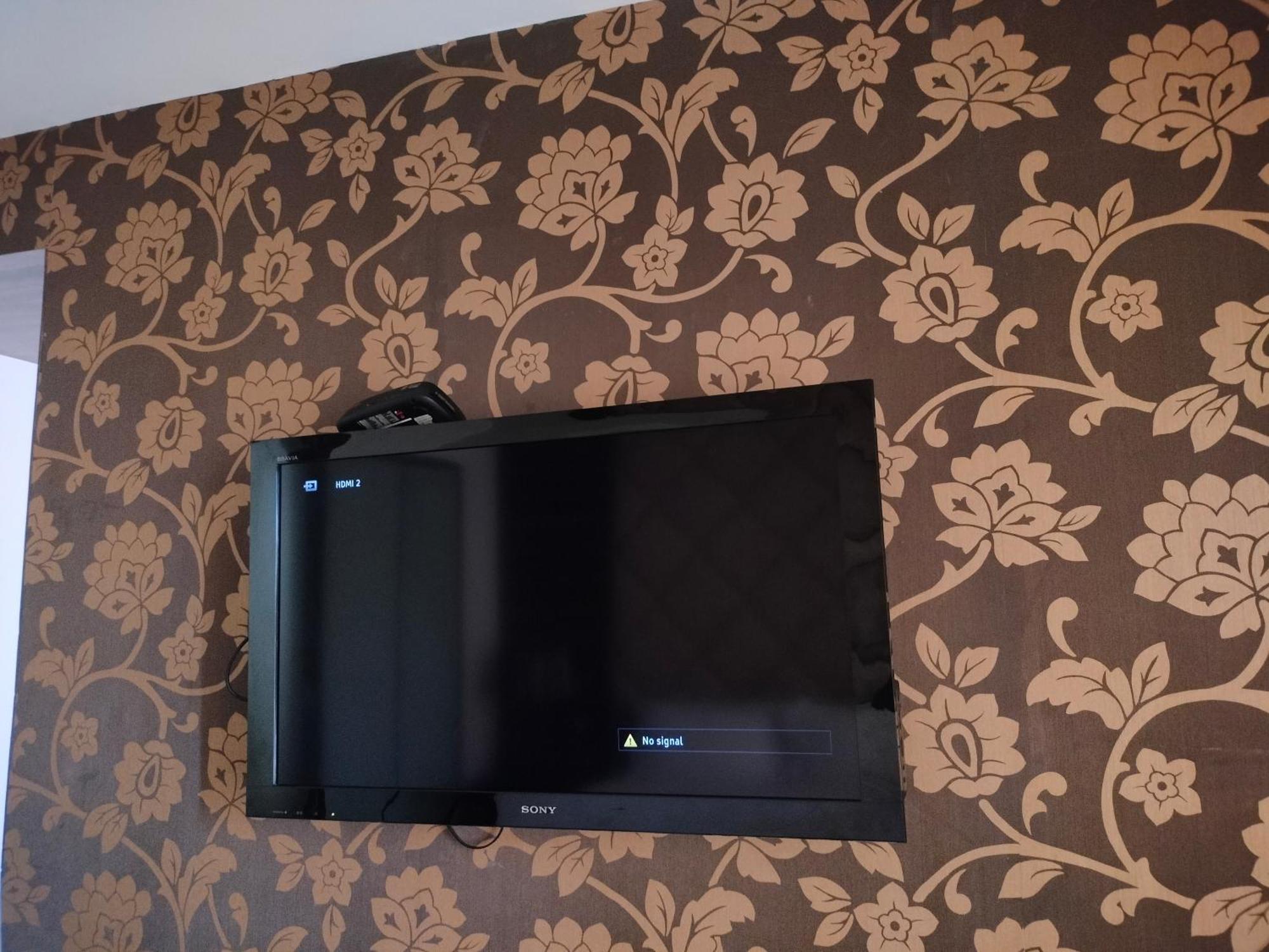 Holiday Inn Chandigarh Panchkula, An Ihg Hotel Zewnętrze zdjęcie A television mounted on a wall